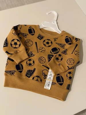 NUEVA SUDADERA DEPORTIVA DORADA 12M Jumping Beans Foto 1 de 4