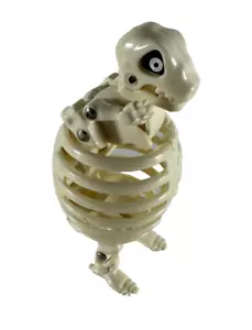 EGGMONSTERS T-REX SCHELETRO ACTION FIGURE BANDAI 1987 - Imagen 1 de 5