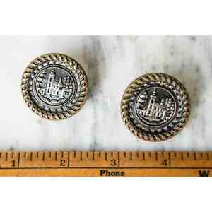 VTG shank buttons embossed with metal castle motif with ornate ribbon details