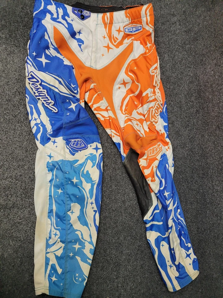 Calça masculina Troy Lee Designs 34 laranja azul GP Star Graphic Motocross MX - Imagem 1 de 4
