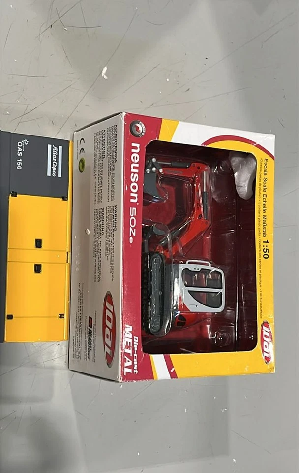 Miniexcavadora hidráulica sobre orugas Joal/DCP 40046 Neuson 50Z3 1/50 fundida a presión sin usar, en caja Foto 1 de 1
