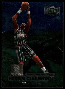 1997-98 Metal Universe Championship #61 Hakeem Olajuwon Houston Rockets - Bild 1 von 2