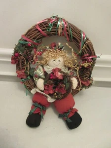 VINTAGE WREATH WITH SITTING DOLL HOLDING A SMALL WREATH -- WREATH IS 13" DIAM. - Picture 1 of 3