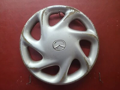 Cubierta de rueda tapacubos Mazda 626 1998-2002 14" 7 radios OEM GD7A-37-170 56536 Foto 1 de 4