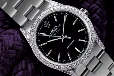 Reloj Rolex Air King para dama 34 mm acero inoxidable diamante esfera negra índice Foto 1 de 4