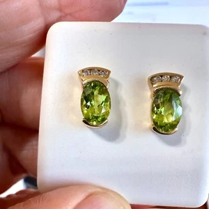 Ohrringe 14 Karat Gelbgold 7 x 5 mm ovale natürliche Peridot mit Diamanten 0,05 kt. - Bild 1 von 10