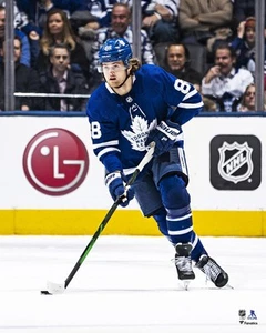 William Nylander Toronto Maple Leafs Unsigned Blue Jersey Skating Photo - Picture 1 of 1
