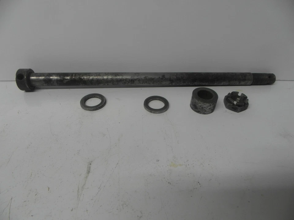 Suzuki TM400 rear wheel axle part number 64711-32101  09180-15028 - Image 1 of 1