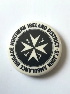 Northern Ireland District St John's Ambulance Brigade Old Tin Badge. - Picture 1 of 2