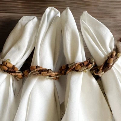 Juego de 4 servilleteros PIER 1 BOHO alambre trenzado madera semilla vidrio iridiscente cuentas Foto 1 de 4