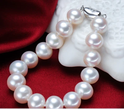 Gorgeous natural 11-12mm real south sea round white pearl bracelet 7.5-8" 925s - Image 1 of 4