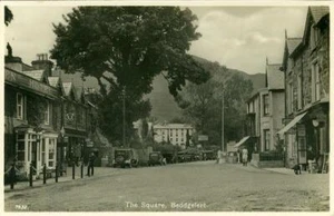 REAL PHOTO POSTCARD OF THE SQUARE, BEDDGELERT CAERNARFONSHIRE, WALES BY SALMON - Picture 1 of 2