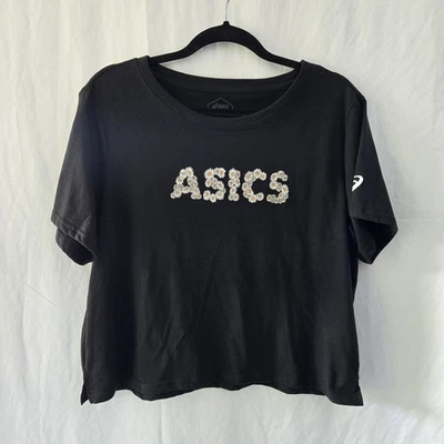 Camiseta recortada con gráfico de margarita Asics negra para mujer XL algodón de origen sostenible Foto 1 de 4