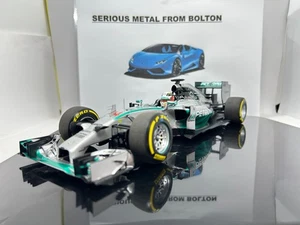 MINICHAMPS 186 140044 MERCEDES AMG WO5 #44 LEWIS HAMILTON F1 W/CHAMPION 1:18 - Picture 1 of 15