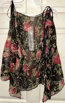 Blusa floral transparente Nolita talla pequeña para dama nueva con etiquetas Foto 1 de 4