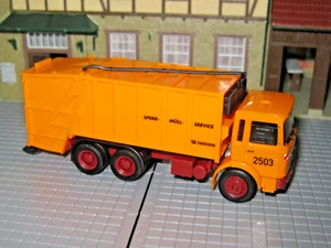 Herpa 311946 - novela diésel - vehículo de basura prensada 3 ejes - naranja - Imagen 1 de 3