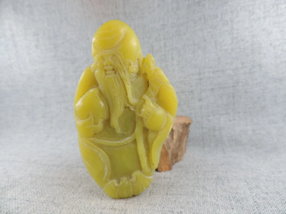 Escultura china tallada a mano amarilla de jade hetiano colgante de estatua de dios de la longevidad 寿星 Foto 1 de 4