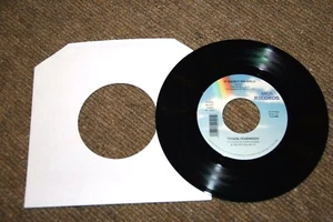 NEW VINYL UNPLAYED CHRISTMAS 45 RECORD TRISHA YEARWOOD... "IT WASN'T HIS CHILD" - Picture 1 of 3