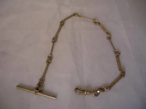Chatelaine / leontina para reloj de bolsillo. Metal dorado. Motivos vegetales - Imagen 1 de 5