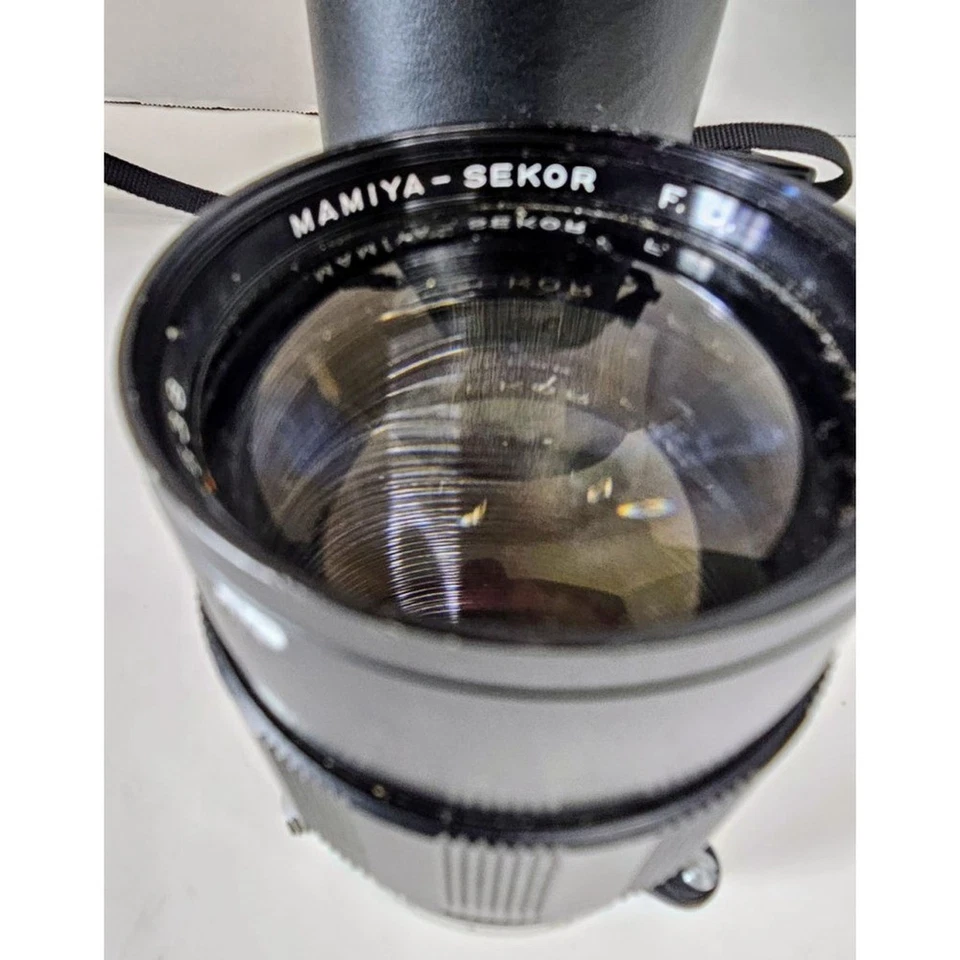 Lente para cámara VINTSGE Mamiya-Sekor negra 135 mm f/2,8 con estuche Foto 1 de 4