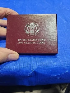 Moneda conmemorativa de medio dólar de prueba de gimnasta olímpica 1992-P revestida de Estados Unidos - Imagen 1 de 6