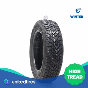 Used 215/65R17 Goodyear UltraGrip Winter 99T - 11.5/32 - Picture 1 of 4