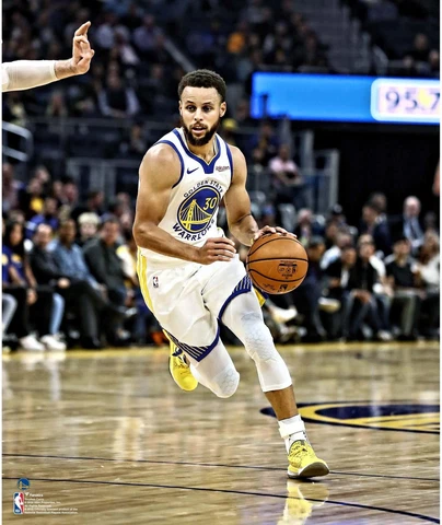 Stephen Curry Golden State Warriors Unsigned Dribbling Photograph Cover