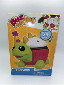 2018 Puz oodles  23 PC "DINOCAKE" DINOSAUR CUPCAKE 3D PUZZLE New - Picture 1 of 5