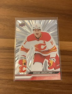 2023-24 Upper Deck Series 1 Outburst Silver Mikael Backlund #27 Calgary Flames