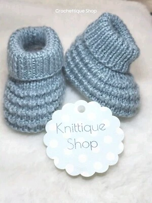 Botines de bebé de punto hechos a mano Foto 1 de 4