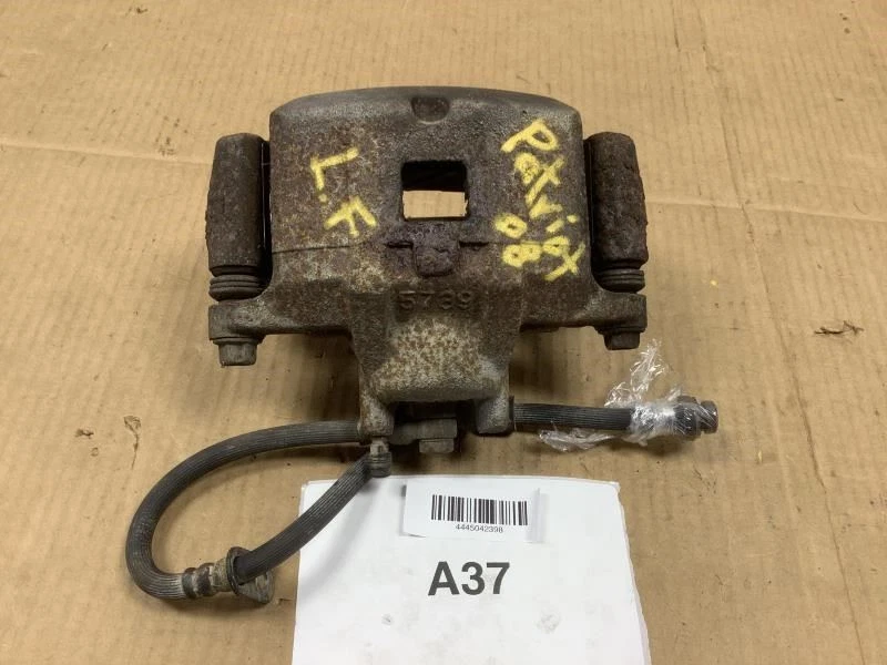Jeep Patriot 2008 2,4 L AWD pinza de freno delantera izquierda compatible con brújula 07-17 OEM+ Foto 1 de 4