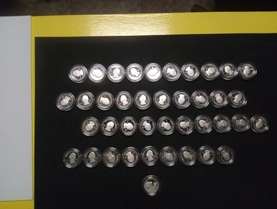 40 cuartos de plata a prueba 2017, State Quarters en cápsulas, Fredrick Douglas, Washington DC Foto 1 de 4