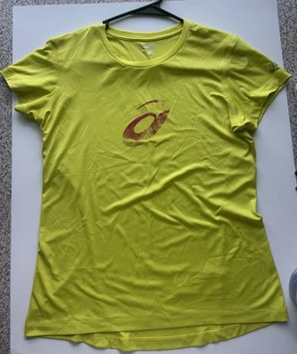 Top amarillo mediano Asics Motion Dry para mujer Foto 1 de 4