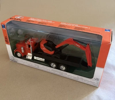New Kubota 1:32 KX080-4 Excavator With Peterbilt Flatbed Truck - Image 1 of 2