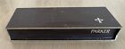 Empty brown plastic hinged box for Parker pens or pencils
