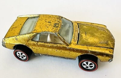 Hot Wheels Redline 1968 Custom AMX US AMC Gold con sobrepulverización de motor interior blanco Foto 1 de 4