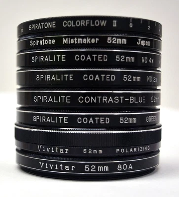 8 Pieces Assortment of 52mm Spiratone, Spiralite and Vivitar Camera Filters - Image 1 of 4