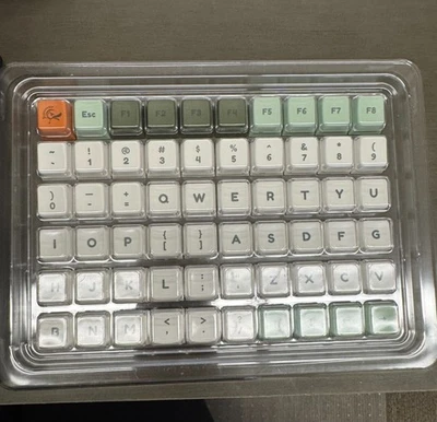 Spare Keycaps - (Green/Orange Theme) - Keyboard keycaps. - Image 1 of 3