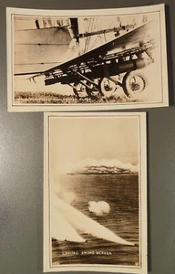 Fotos de la década de 1930 de biplanos marinos, humo y torpedos montados debajo de las alas - Imagen 1 de 2