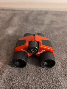 Tasco Infocus 7x21mm Red Color Mini Binoculars 342 Feet To 1000 Yards Range - Picture 1 of 9
