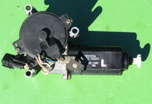 TOYOTA CELICA 90-93 LEFT HEADLIGHT MOTOR ASSEMBLY 85690-20031 OEM ALL TRAC 4WD - Picture 1 of 9