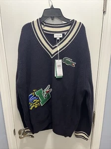 Lacoste Neu mit Etikett 100 % Wolle Urlaub Comic Abzeichen gestreifter V-Ausschnitt Pullover Größe FR 6/XL - Bild 1 von 7
