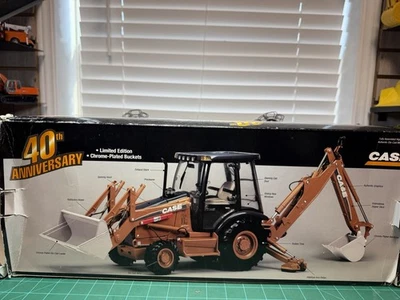 ERTL Case 580 Super M Series  Backhoe 40th Anniversary  1/16 - Image 1 of 4