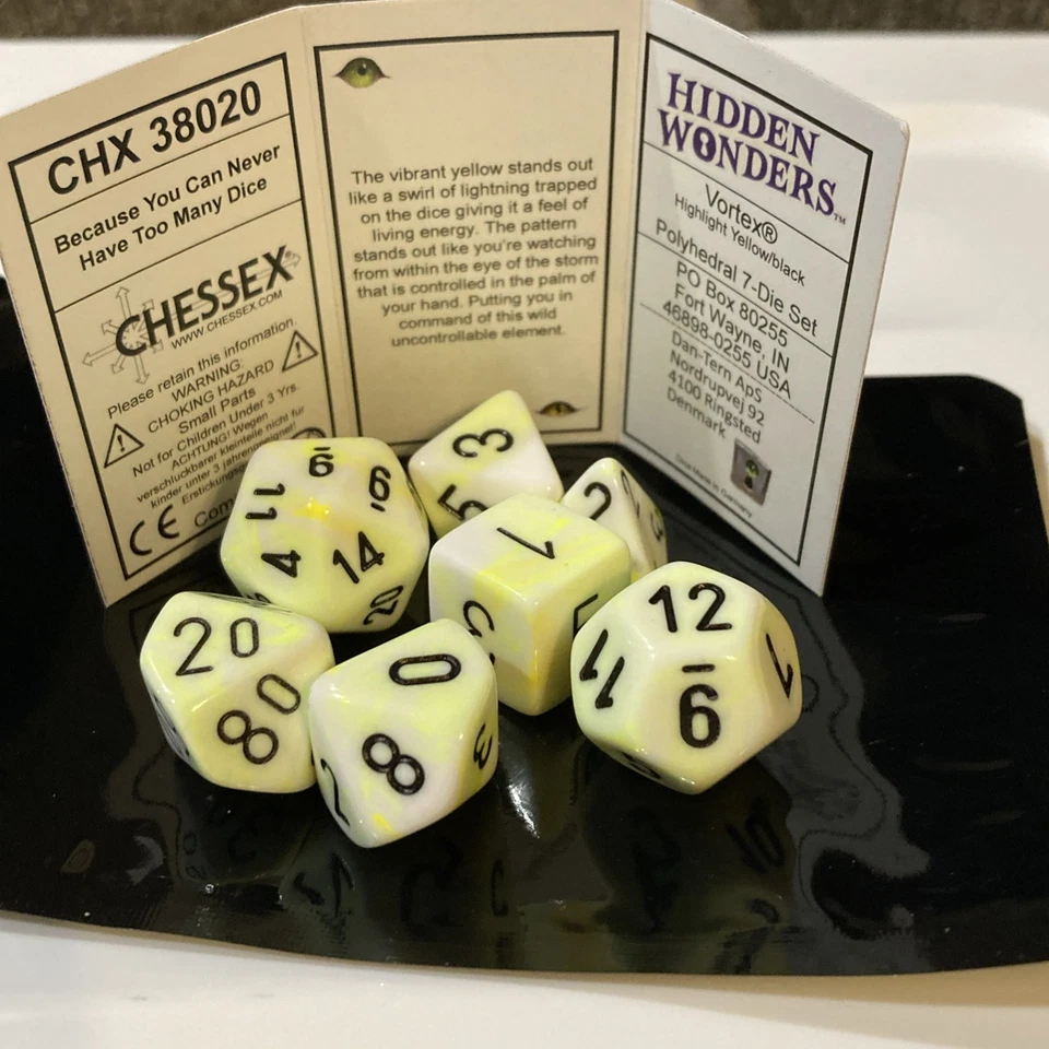 Juego de 7 dados Chessex 38020 Hidden Wonders Vortex Highlight amarillo/negro poliédrico Foto 1 de 1