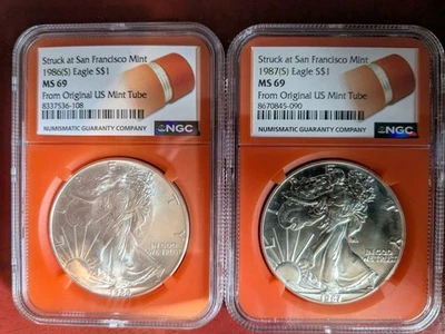 1986(S) & 1987(S) MS69 American Silver Eagle Set Original Mint Tube Orange Label - Image 1 of 2