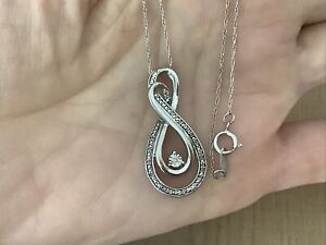 Sterling Silver Eternity Swirl Music Note Accent Diamond Necklace 20”