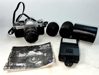 Cámara fotográfica vintage Canon AT-1 35 mm con lente de 50 mm y otros accesorios Foto 1 de 4