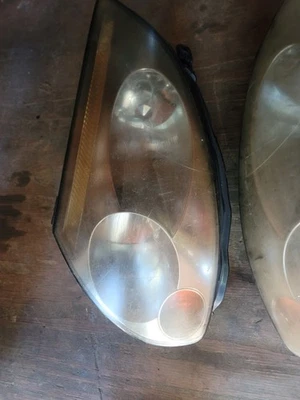 Infiniti G35 2004 cupé faros de stock izquierda y derecha Foto 1 de 3