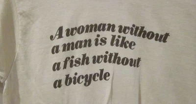VTG T SHIRT ~1970's A WOMAN WITHOUT A MAN IS LIKE...GREAT RETRO FONT SIZE S - Image 1 of 4