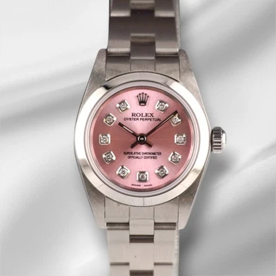 Reloj Rolex Oyster Perpetual 25 mm acero inoxidable esfera rosa 67180 Foto 1 de 4